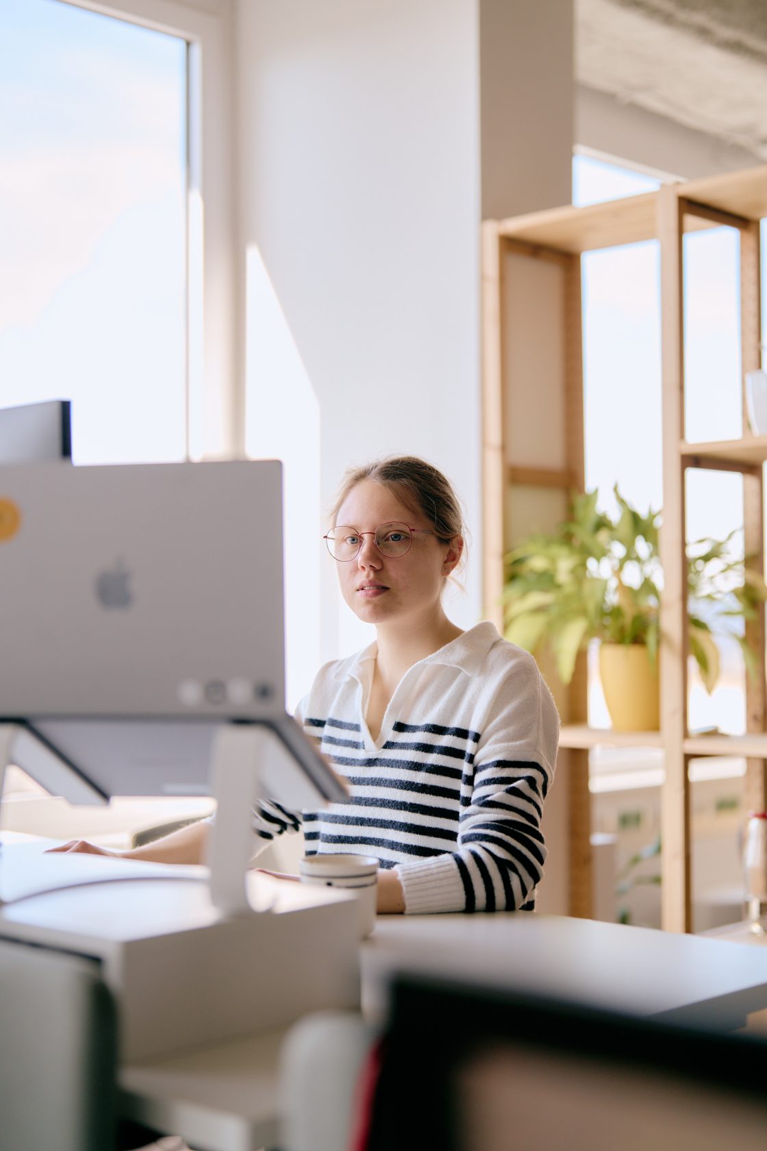 Woman working on Macbook